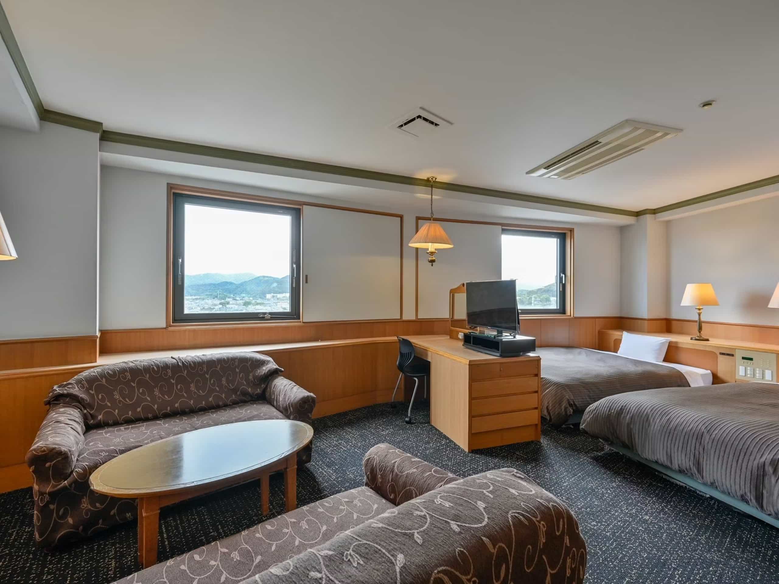 Deluxe Twin Room with Sofa up to 4 guests (Non-Smoking)